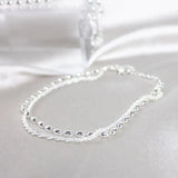 Set di bracciali eleganti in argento con pietre di zirconia