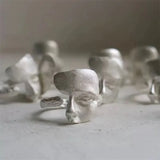Anello Regolabile con Faccia Astratta in Argento