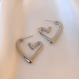 Orecchini Funky a Forma di Cuore in Oro e Argento
