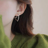 Orecchini Funky a Forma di Cuore in Oro e Argento