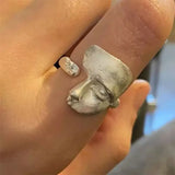 Anello Regolabile con Faccia Astratta in Argento