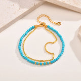 Bracciale in Oro Doppia Catena Senza Tempo con Turchese