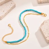Bracciale in Oro Doppia Catena Senza Tempo con Turchese