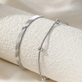 Set di Cavigliere Stratificate Eleganti in Oro 2pz