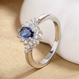 Anello Elegante in Oro Bianco con Turchese a Forma di Fiore